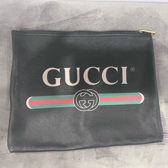 Gucci Handbags - Authentic Gucci medium leather logo clutch
